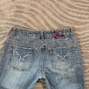 Premium Blue Denim Jeans with Rhinestone Accents on Back Pockets